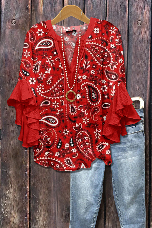 Florina™ - Blus med Blommönster, Volangärmar och Feminint Snitt